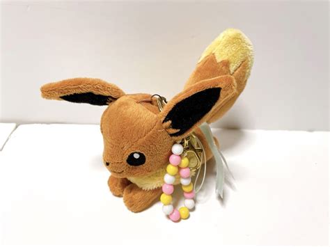 ポケモンセンター イーブイ チャーム付きマスコットぬいぐるみ 2013 Shop At Mercari From Japan Buyee