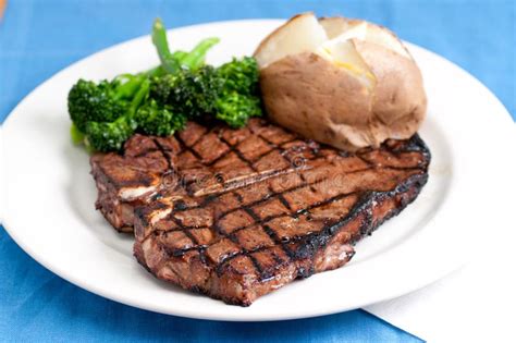 T Bone Steak And Baked Potato Stock Image Image Of Potatoes Fillet