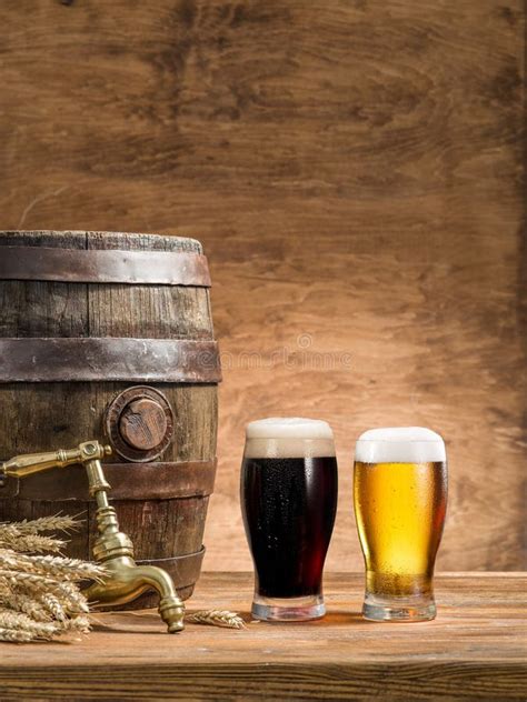 Glasses Of Beer And Ale Barrel On The Wooden Table Craft Brewery Stock