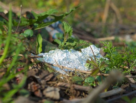 Why You Should Add Aluminum Foil To Your Mulch