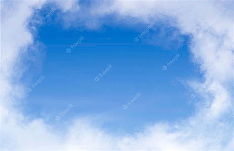 Premium Photo | Clouds frame on a blue sky background