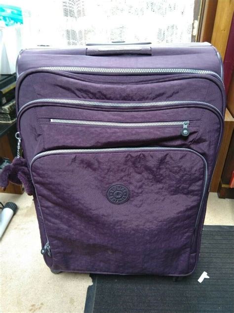 Large purple Kipling Suitcase, expandable, 4 rotatable wheels | in Harrow, London | Gumtree