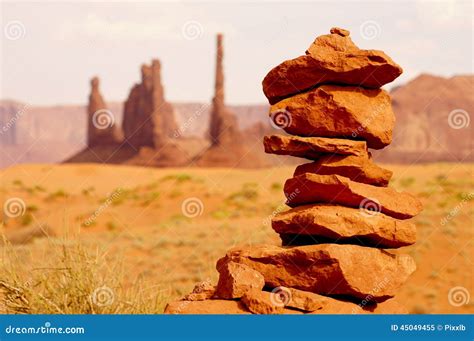 Small Rock Tower In Front Of Impressive Desert Landscape Stock Image