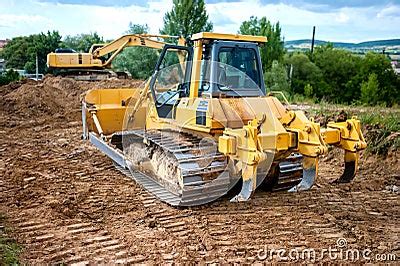 Industrial Backhoe Truck Moving Earth And Soil In Quarry Constru