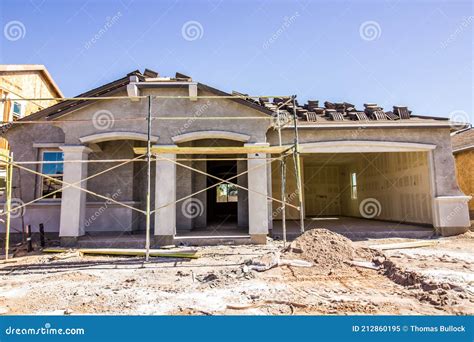 Stucco One Story Home Under Construction In Housing Project Stock Image