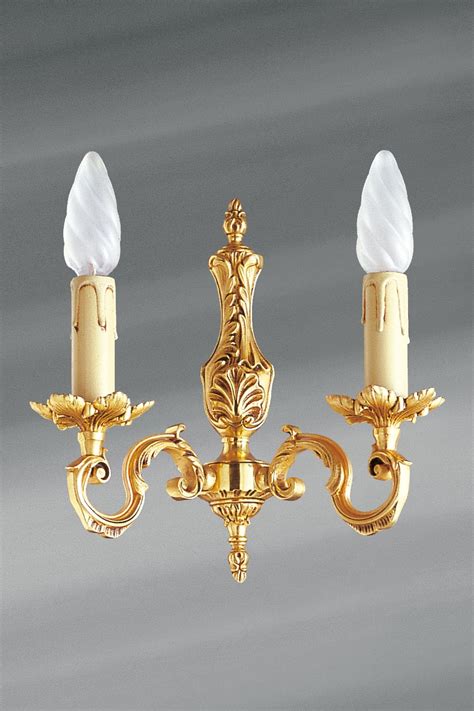 Applique en bronze Louis XV deux lumières Lucien Gau luminaires