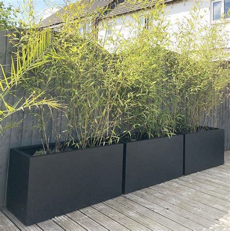 Large Modern Bamboo Trough Planters In Black Installed On Our Decking