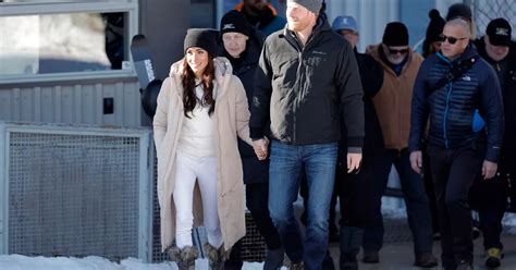 Harry And Meghan Put On Defiant Display To Hit Ski Slopes After Royal