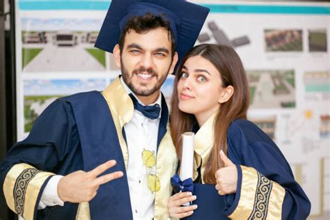 Graduation Peace Sign Stock Photos, Pictures & Royalty-Free Images - iStock