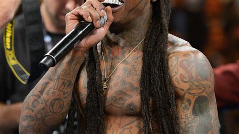 Lil Wayne got two more face tattoos