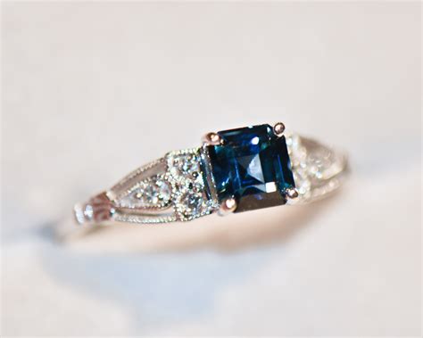 Vintage Style Engagement Ring With Emerald Cut Peacock Sapphire