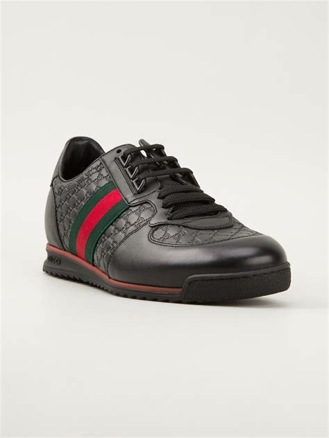 Gucci Monogram Embossed Sneakers in Black for Men | Lyst