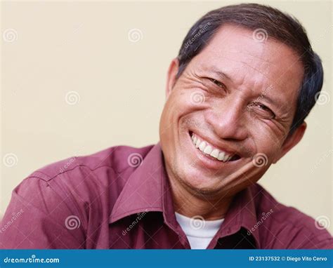 Mature Asian Man Showing Thump Up With A Glass Royalty Free Stock Photo