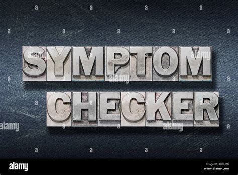 Symptom Checker Phrase Made From Metallic Letterpress On Dark Jeans