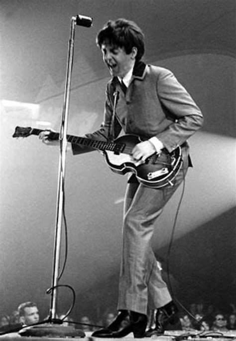 Mr. Paul McCartney of The Beatles playing his bass during the band’s ...