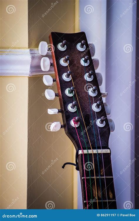 Guitar Headstock On Wall Background CartoonDealer 86291197