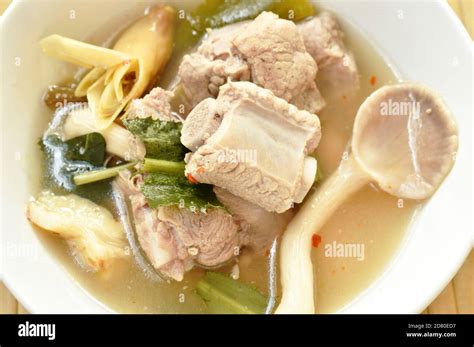 Hot And Spicy Pork Bone With Tamarind And Thai Herbs Soup On Glass Bowl Stock Photo Alamy
