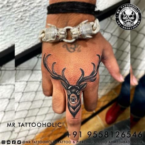 Deer middle finger tattoo designs for boy cool tattoo Mr Tattooholic ...