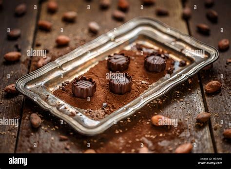 Chocolate mousse in very thin-sliced dark chocolate Stock Photo - Alamy
