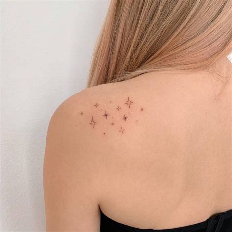 Fine line stars tattoo on the shoulder. | Star tattoos, Shoulder ...