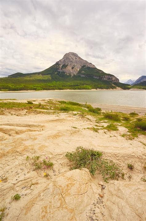 Portrait View Landscape Of Barrier Lake With Mount Baldy In The