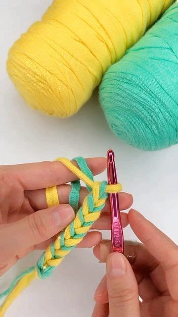 Someone Is Crocheting The End Of A Piece Of Yarn