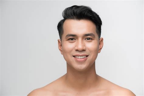 Premium Photo Photo Of Smiling Mature Man Standing Isolated Over White Wall Background Naked