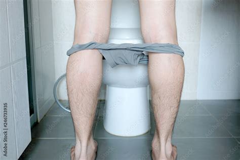 Leg Of Man Remove Panties And Standing Peeing To Toilet Bowl In