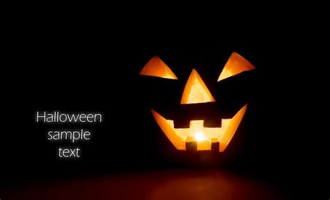 Free Photo | Creepy pumpkin with black background