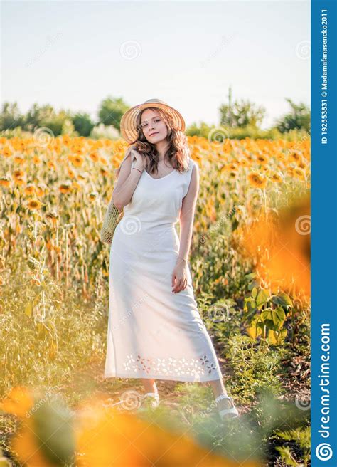 Photo Of Summer Girl In The Sunflowers Stock Image Image Of Yellow