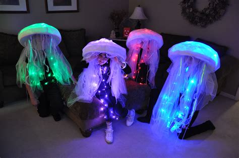 Jellyfish costumes. Made these for our 4 kids. Used LED lights, sombreros, bubble wrap, lace f ...