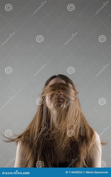 Brunette Girl With Hair Over Her Face Stock Image Image Of Portrait