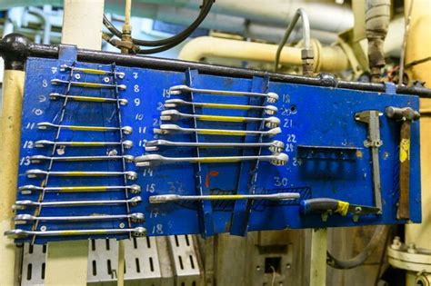 Premium Photo Instrument Board On Vessel Spanners Engine Room Interior