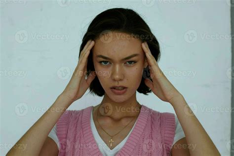 Pretty Brunette In Pink Vest Posing Light Background Stock Photo At Vecteezy