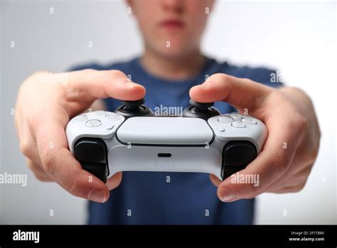 Teenager playing on a Playstation 5 or PS5 Stock Photo - Alamy