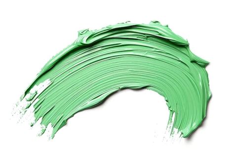 Premium Photo | Green color corrector stroke on white background makeup ...