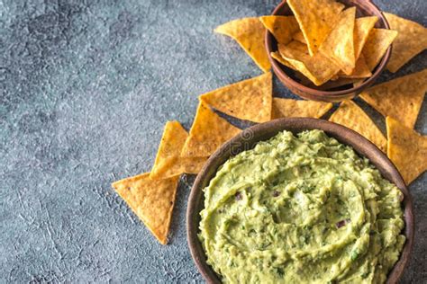 Guacamole in Bowl with Tortilla Chips Stock Image - Image of chip ...