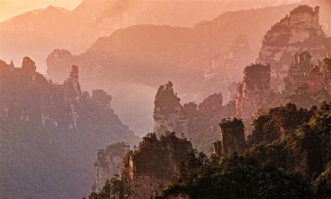 Sunrise At Zhangjiajie National Park Photograph by John Wang | Fine Art ...