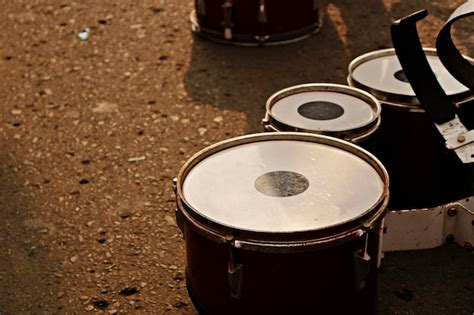 Premium Photo | Marching band instrument laying on the street