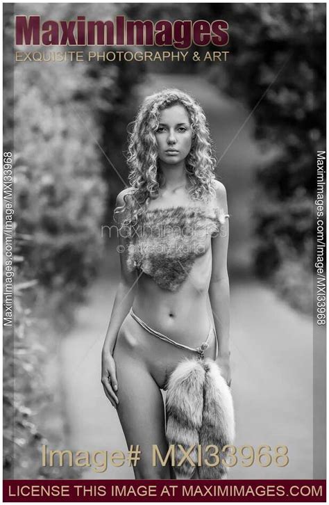 Photo Of Fine Art Nude Black And White Portrait Of A Half Naked Woman In Wild Fur Clothes