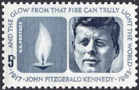 A Postage Stamp With An Image Of John Fitzgerald Kennedy And The Words