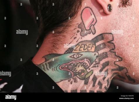 Turin, Italy. 10th Oct, 2015. The tattoo of Fedez on his neck. The ...