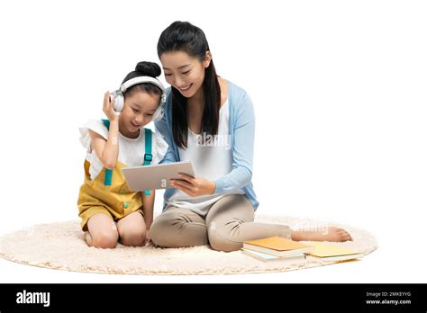 A Young Female Teacher Counseling Students Learning Stock Photo Alamy
