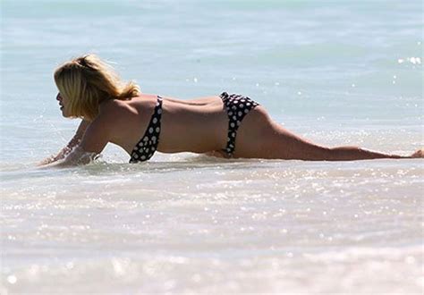 ALICE EVE In Polka Dot Bikini On A Beach In Miami HawtCelebs