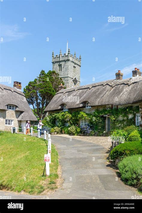 Thatched Cottages And All Saints Church Godshill Isle Of Wight