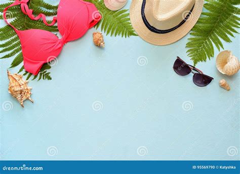 Female Summer Bikini Swimsuit And Accessories Collage On Blue With Palm