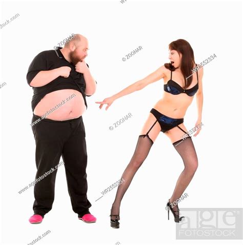 Almost Naked Woman Appalled And Surprised By The Size Man Stomach