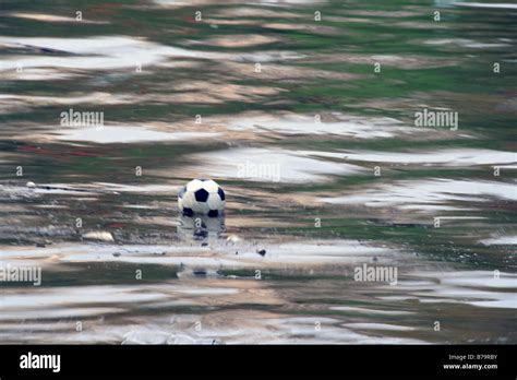 One Lost Ball Floating Down River Stock Photo Alamy