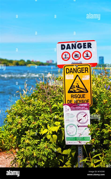 Rapids warning sign against river background in lachine rapids park in ...