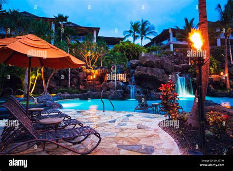 Tropical Resort Pool at Sunset in Hawaii Stock Photo - Alamy